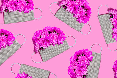 Medical face mask with chrysanthemum flower decor on pink