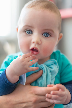 Adorable toddler with a confused and curious look on his face