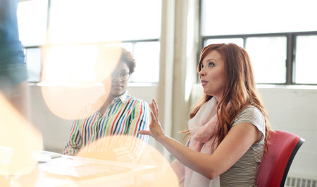 Candid picture of a university team working together.の写真素材