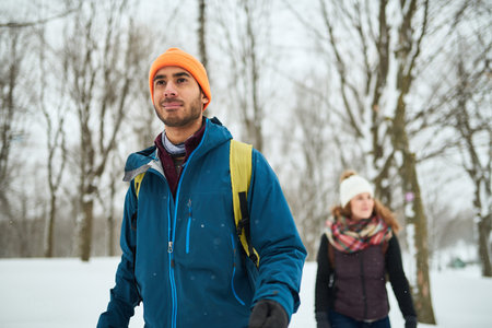 Smiling diverse couple exploring the nature on Canada while walk