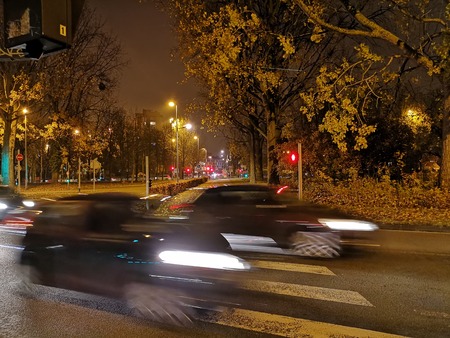 Traffic on night road, traffic lights and street lightingの写真素材