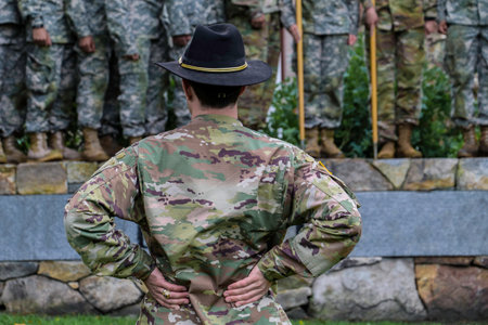 Commander standing from of soldiers