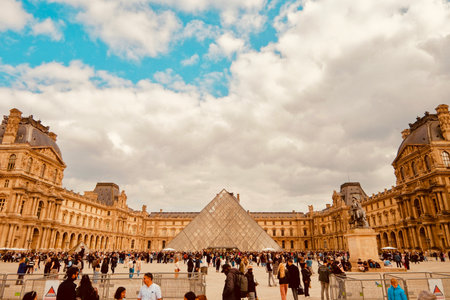 Tourists visiting the famous Louvre museum in Paris, Franceの写真素材