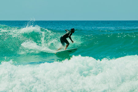 Surfing on the ocean wave. Surfing on the ocean wave. Lacanau, Franceの写真素材
