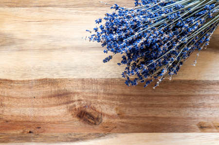 Dried lavender bunch on a wooden backgroundの写真素材