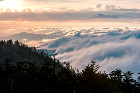 Sunset and rolling clouds over the Great Smokey Mountains.の写真素材