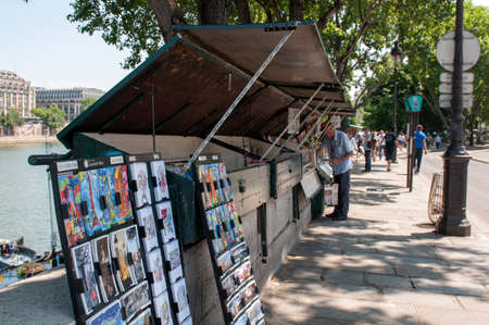 Stands selling books and art along the river Seine in Parisのeditorial素材
