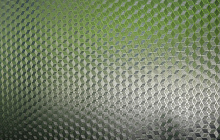 Corrugated glass with a geometric pattern imitating volumetric cubes for the background, white, gray, greenの写真素材