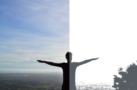 silhouette of a young man who spread his hands to the sides, divided into two partsの写真素材