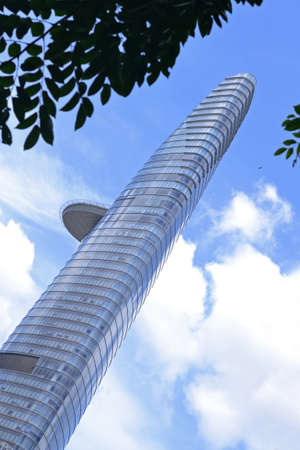 Vietnam, Ho Chi Minh City - JUNE 7, 2018. Bitexco Financial Tower against the sky, bottom view, diagonalのeditorial素材