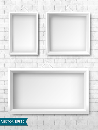 Set of white frames on a brick wall for your design.のイラスト素材