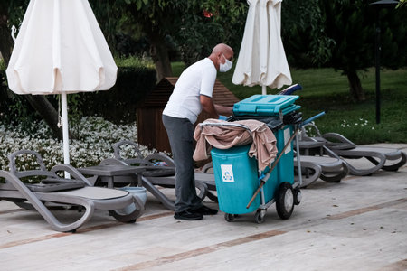 Belek, Turkey - October 2020: Hotel staff wearing face masks in an all-inclusive hotel. Safety...