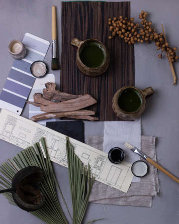 matcha green tea in a ceramic cup on a dark background top viewの写真素材