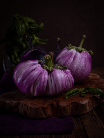 still life with vegetables on a dark background