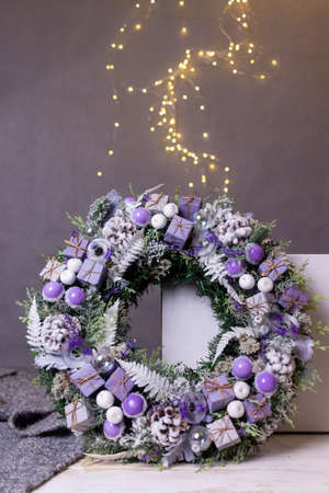 A traditional Christmas composition in lilac on a gray backgroundの写真素材