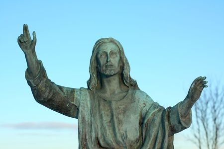 Jesus figure with hands upの写真素材