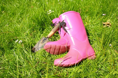 Pink wellingtons in the Spring gardenの写真素材