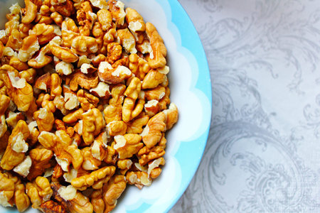 A bowl of walnuts , baking ingredient