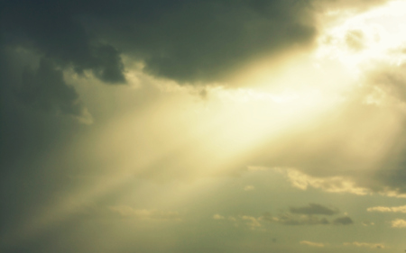 Beautiful dramatic sky with rays of sun, horizontalの写真素材