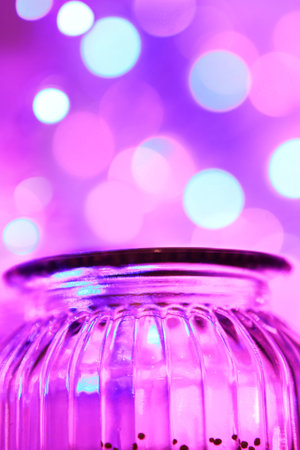 Magical glas jar and bokeh lights close upの写真素材