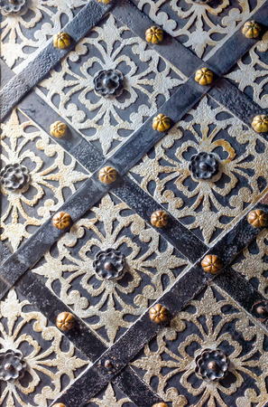 Old, metal church door backgroundの写真素材