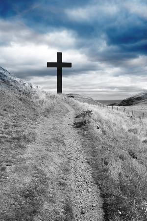 The Cross of Jesus Christ and beautiful cloudsの写真素材