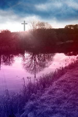 The Cross of Jesus Christ and beautiful cloudsの写真素材