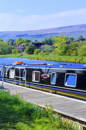Canal with boats in Scotland, UKの写真素材