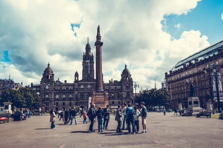 Tourists at the George Square in Glasgow, Scotland, 01.08.2017のeditorial素材