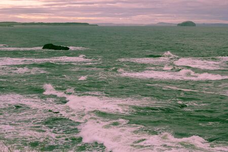 Stormy sea in Dunbar, a seaside town in Scotland, UKの写真素材