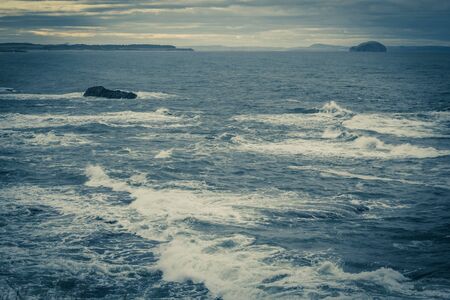 Stormy sea in Dunbar, a seaside town in Scotland, UKの写真素材
