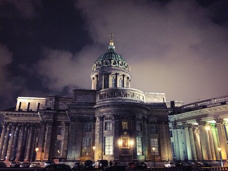 St Petersburg, Russia. Illuminated Cathedral of Our Lady of Kazan, Russian Orthodox Church in Saint Petersburg, Russia at night with sky cloudsの写真素材