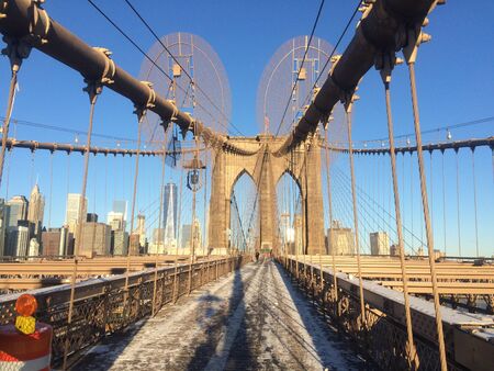 A view of the Brooklyn Bridge in New York City.の写真素材