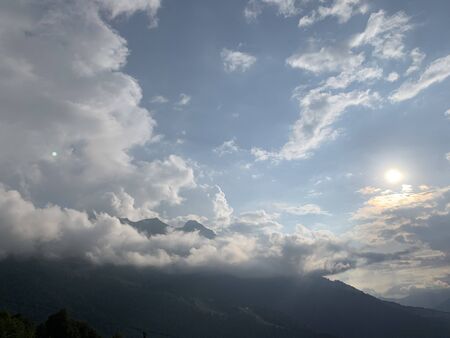 Smoky mountain landscape with mountain and light rays before sunset.の写真素材
