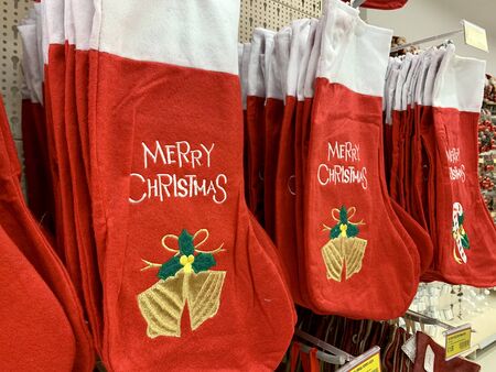 Christmas symbol. Red and white Christmas socks with ornamentの写真素材