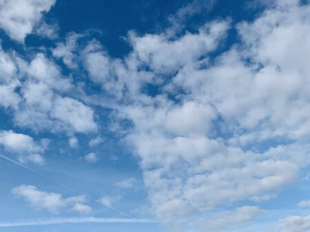 blue sky is covered by white cloudsの写真素材