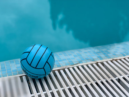 inflatable blue sport ball toy near the swimming pool in the hotel