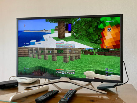 05.04.2020 Cyprus Paphos Tv set computer with minecraft computer game on screen in the home during...