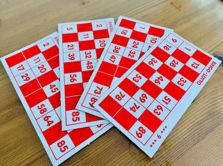 05.04.2020 Cyprus Pafos Bingo cards game or lotto cards, red and white on the tableのeditorial素材