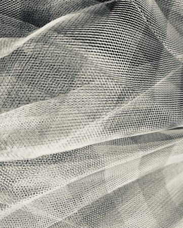 Abstract soft chiffon tulle crumpled texture backgroundの写真素材