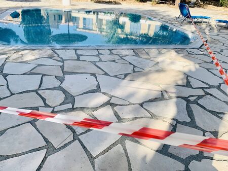 Swimming pool closed for quarantine period. Virus protection. Cyprus summerの写真素材