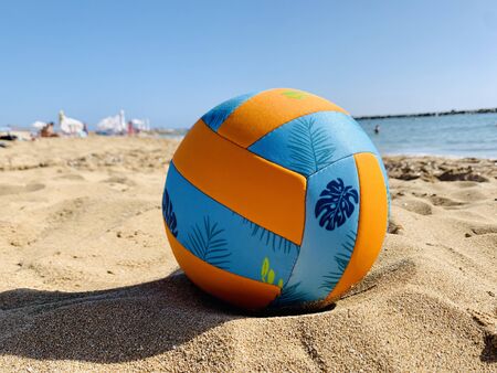 colorful beach ball on nature coast landscapeの写真素材