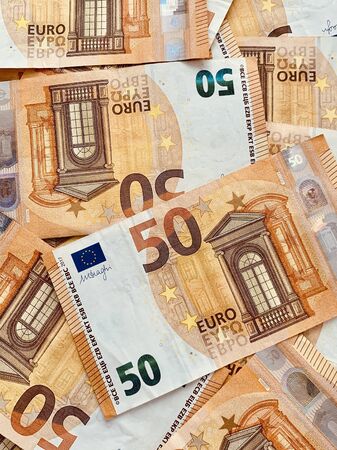 Pile of 50 euro banknotes business finance backgroundの写真素材