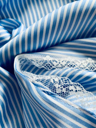 blue and white striped silk texture closeupの写真素材
