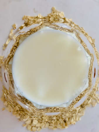 Closeup of oat milk, the concept of a vegetarian diet. top viewの写真素材