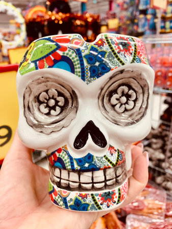 Dios de los muertos, day of the death, decoration in a memory of death relatives of Mexican people. Painted sculls, flowers and colorful decorations.の写真素材