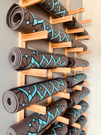 yoga mats in yoga club on the wall decorationの写真素材