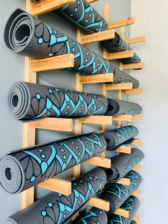 yoga mats in yoga club on the wall decorationの写真素材