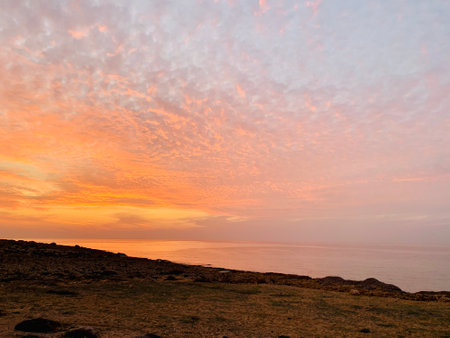 Pink orange Sunset over the sea Burning Down Cyprusの写真素材