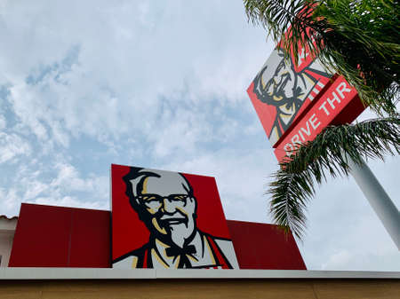 Cyprus Paphos January 17, 2020 KFC drive through sign on KFC Kentucky Fried Chicken restaurantのeditorial素材